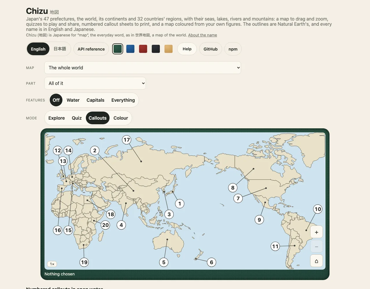 The demo on a desk, in English, in Callouts mode: the page header with the language chooser, five cloth patches and the Help switch, the choice of map (the whole world), part, features and mode, the world on green felt with twenty countries numbered by white circles in the sea and a thin leader line from each circle to its country, and the start of the explanation under the map