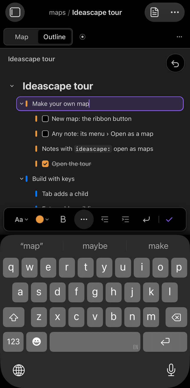 Typing into a row on a phone, a bar of editing keys above the keyboard