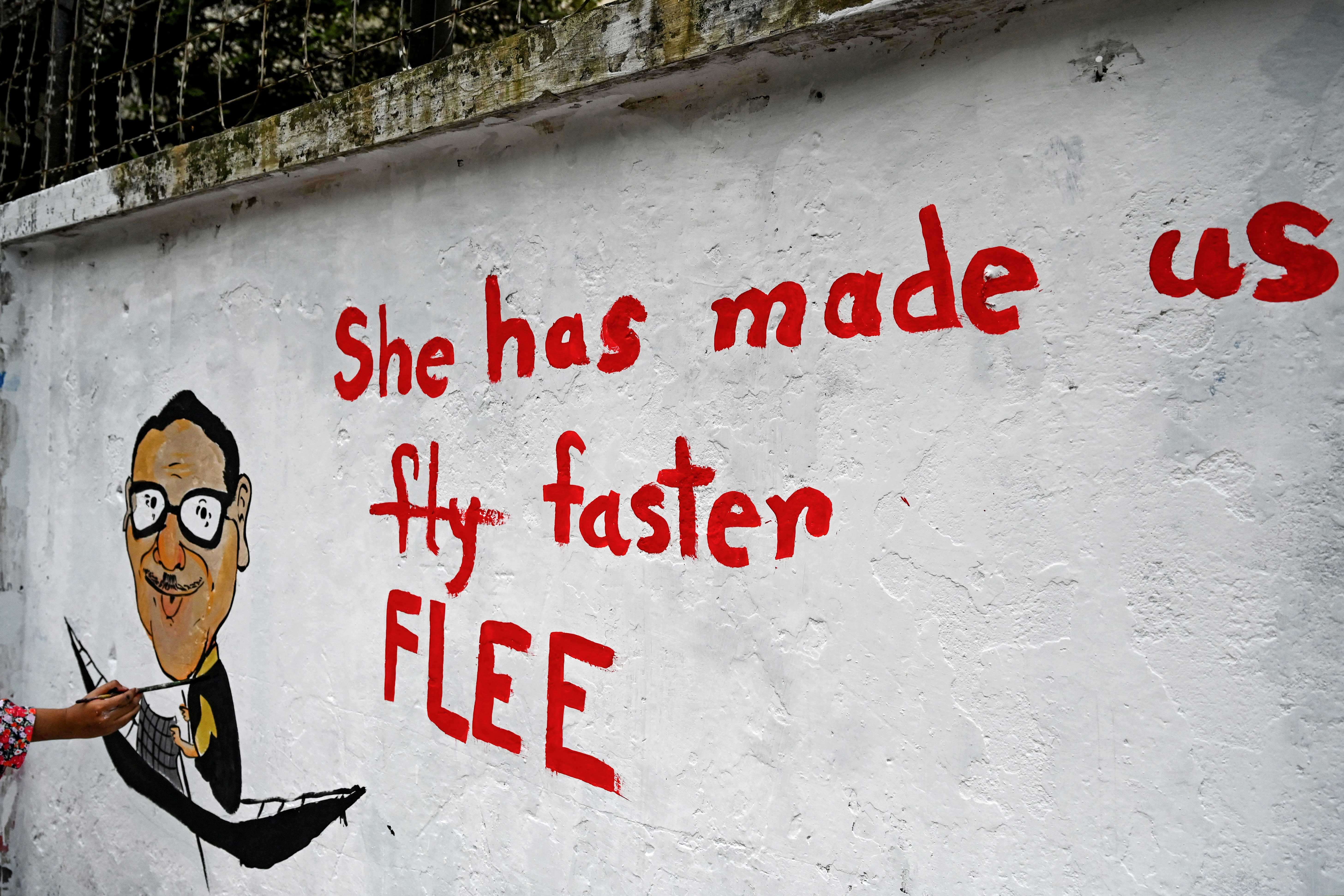 A graffiti of General secretary of Bangladesh's Awami League party Obaidul Quader, on a wall at Dhaka university