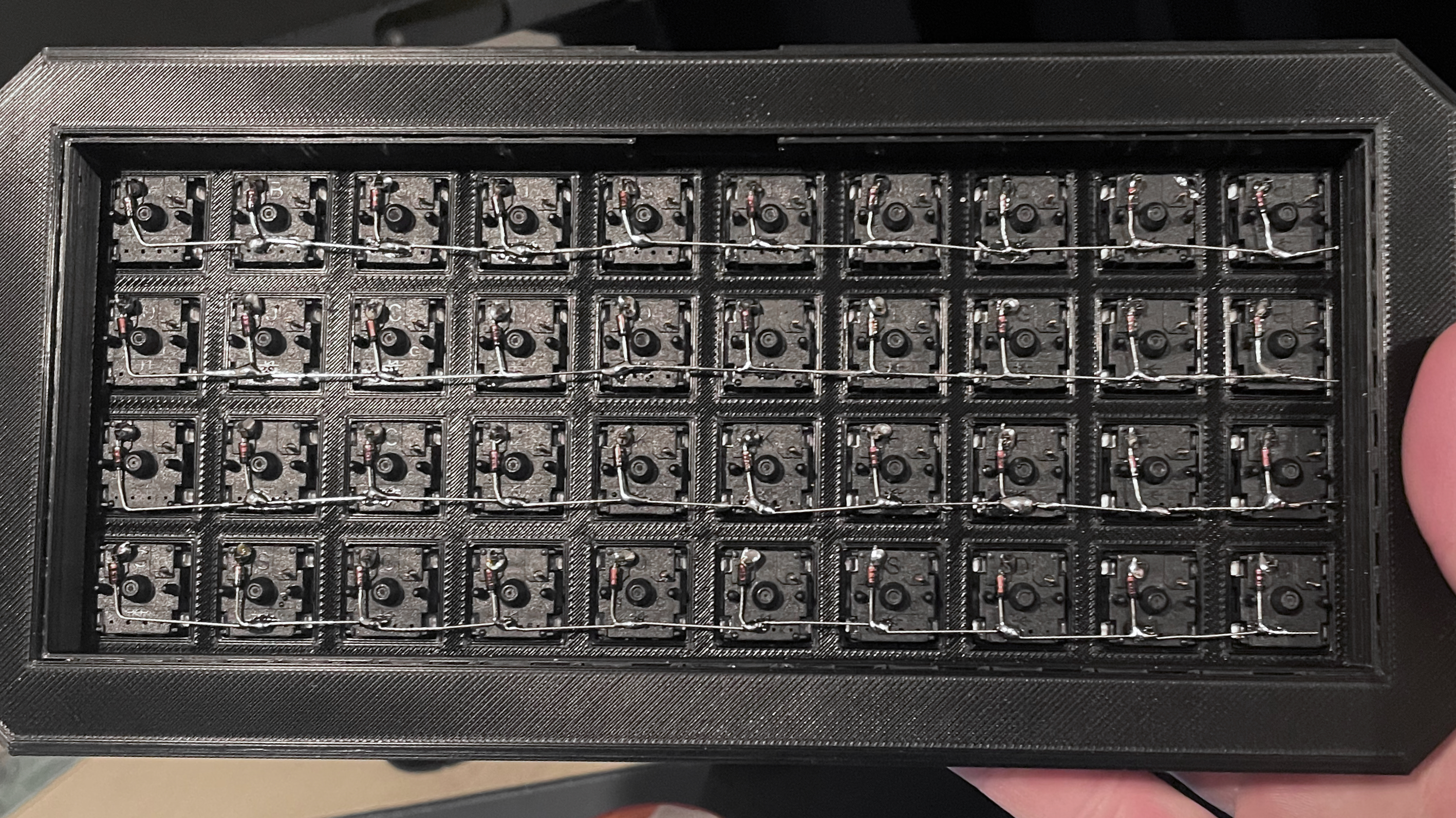 Photo showing 40 diodes connected to switches in rows of 10