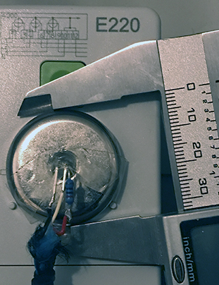 Phototransistor with pull-up resistor and magnet