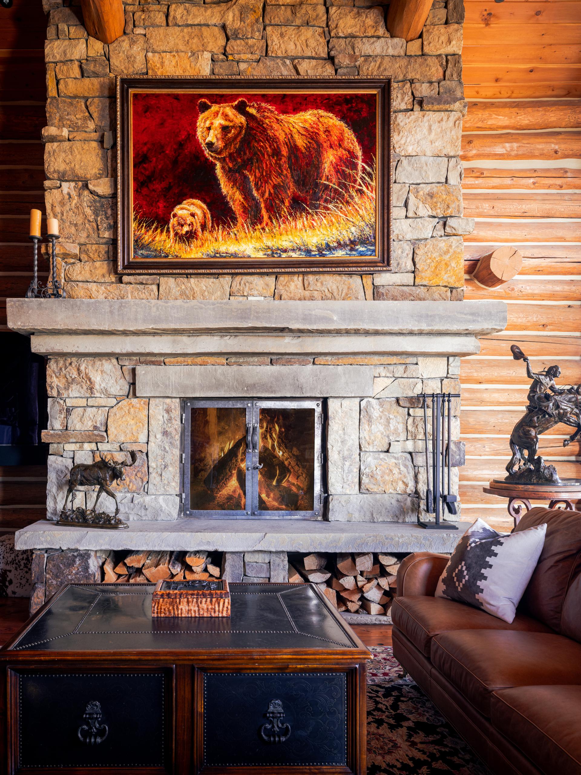 Floor-to-ceiling stone fireplace in the great room at 168 Charlie Russell Loop