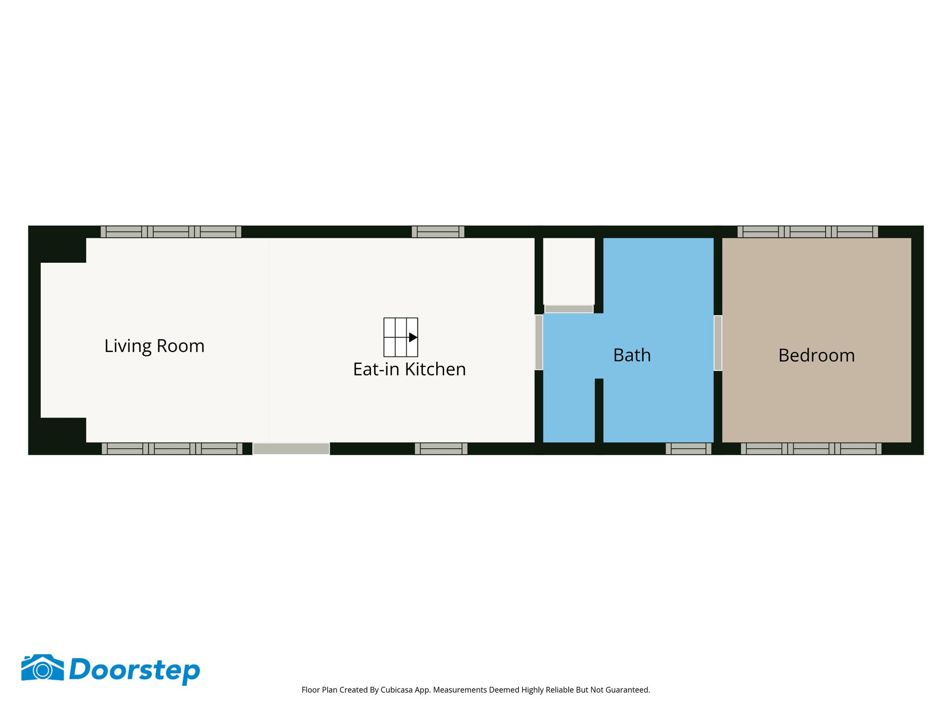 Floor plan showing the living room, eat-in kitchen, bath and bedroom