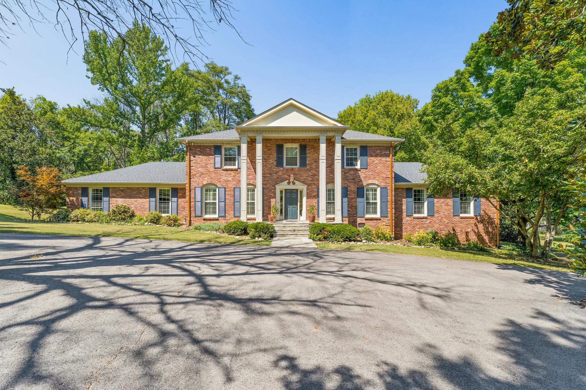 806 Willowdale Court, a two-story reclaimed brick Colonial on two level acres in the Oak Hill area of Nashville, Tennessee