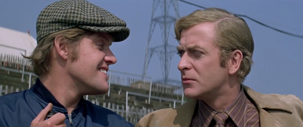 Michael Caine looking upset with Michael Standing