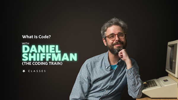 A bearded man wearing a blue shirt resting his head on his fist, sitting next to an Apple II+ Computer. The text reads: What is code? with Daniel Shiffman (The Coding Train). Nebula Classes.