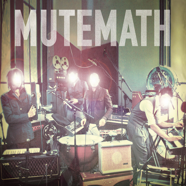 Album art for MUTEMATH album with the band members in a rehearsal room with their instruments, their faces whitewashed