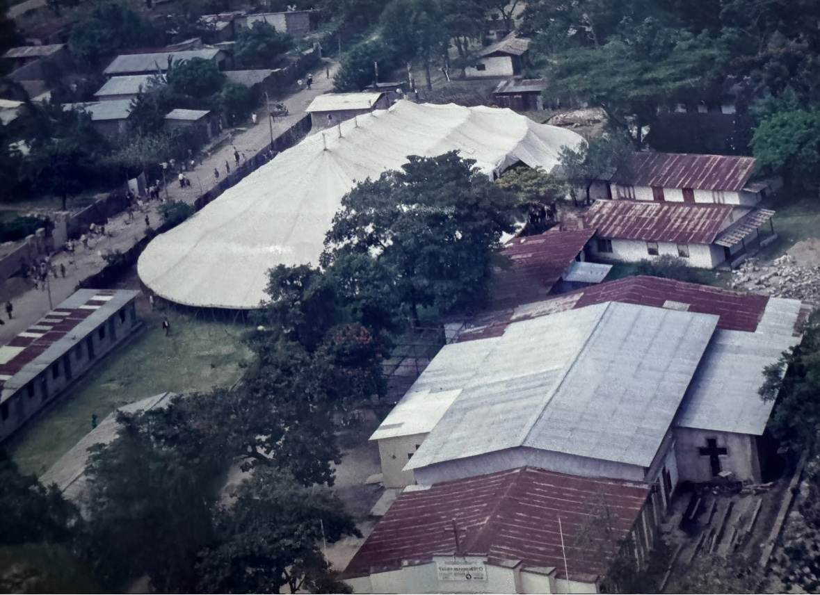 A campaign tent beside a local church