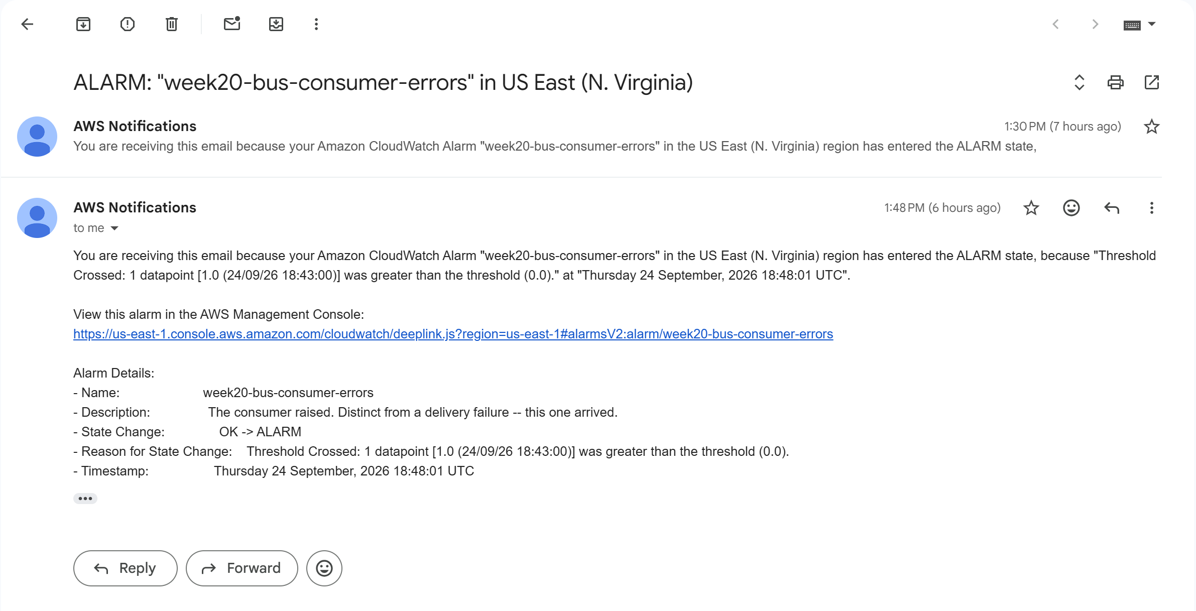 The alarm notification as it arrives in an inbox: subject ALARM week20-bus-consumer-errors, state change OK to ALARM, with the account id and the subscriber address redacted