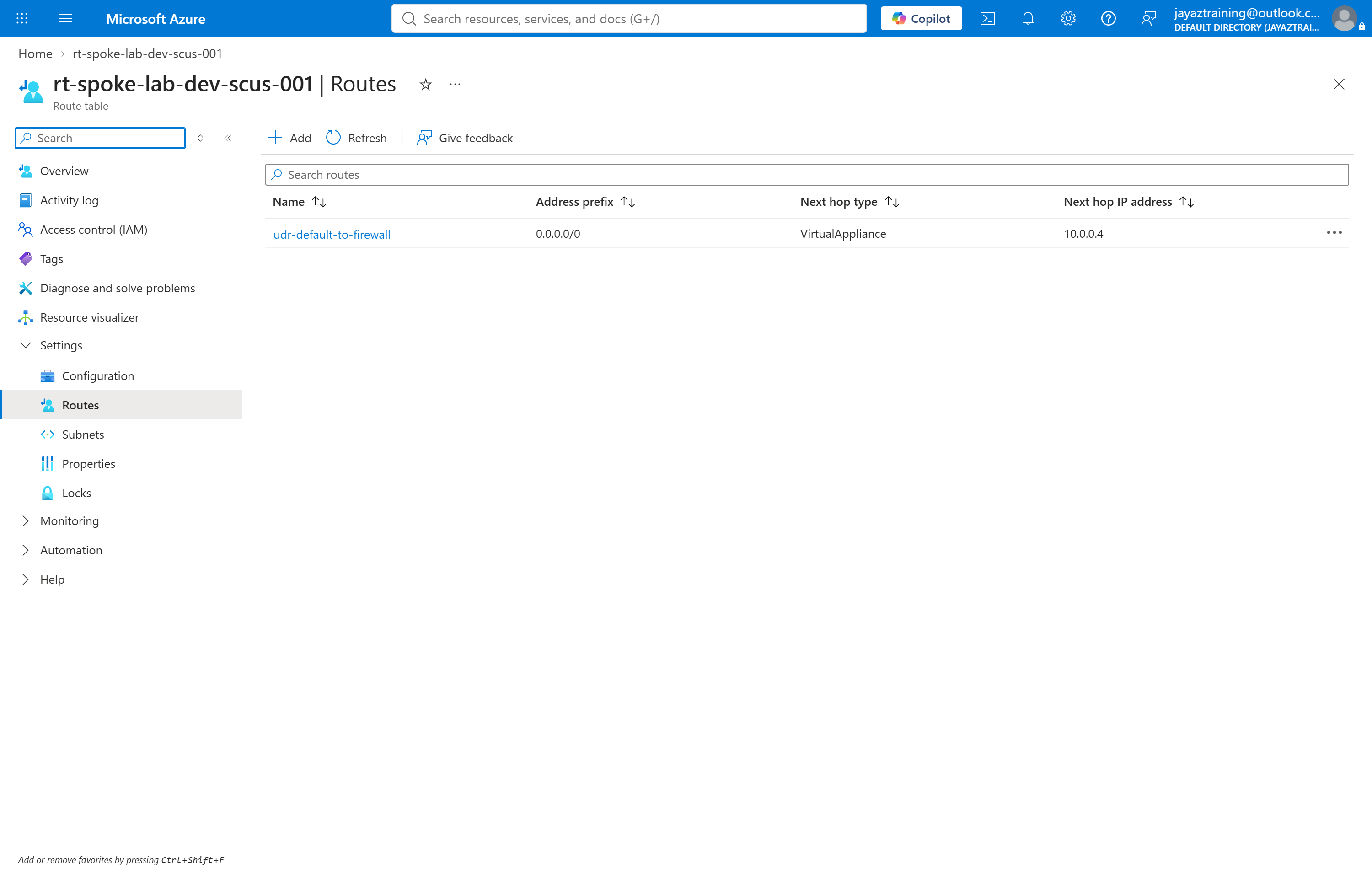 Azure portal route table showing a route named udr-default-to-firewall for 0.0.0.0/0 with next hop type VirtualAppliance and next hop IP address 10.0.0.4