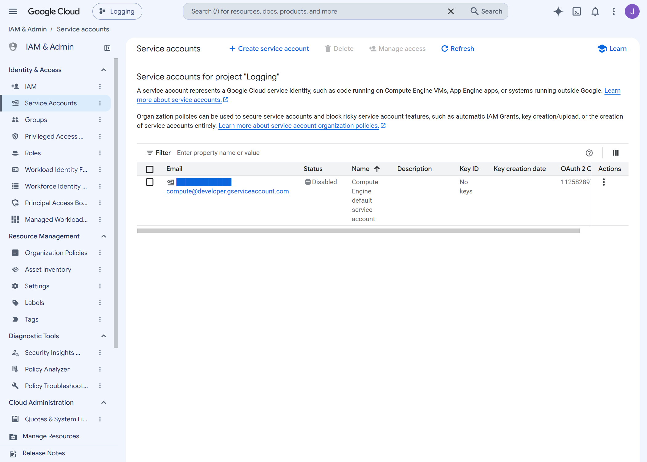 The same service accounts list after the change, showing the default Compute Engine service account with status Disabled