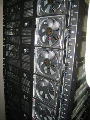 Photo of a server rack full of 3U computers.