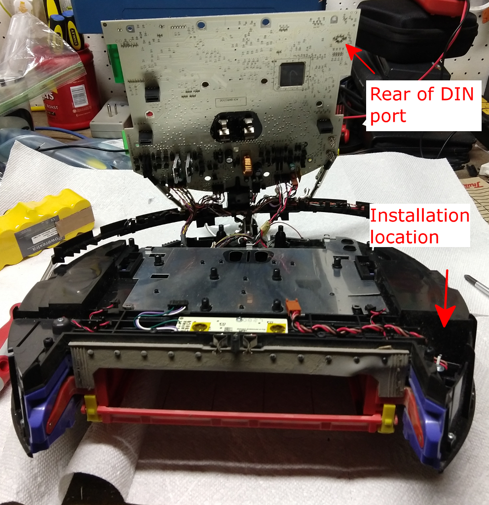 Wheel well starboard opening and rear of DIN connector