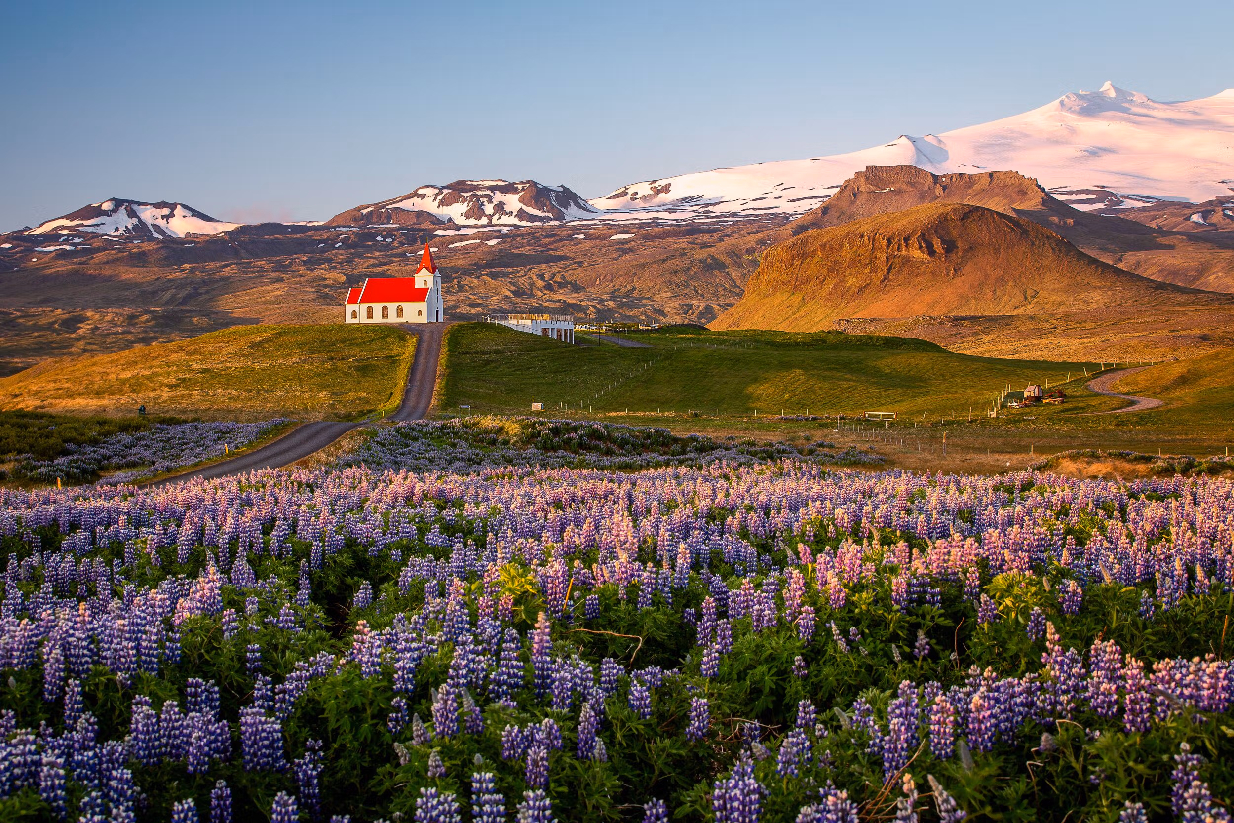 Kirkjufell mountain with waterfalls in foreground on Snæfellsnes Peninsula