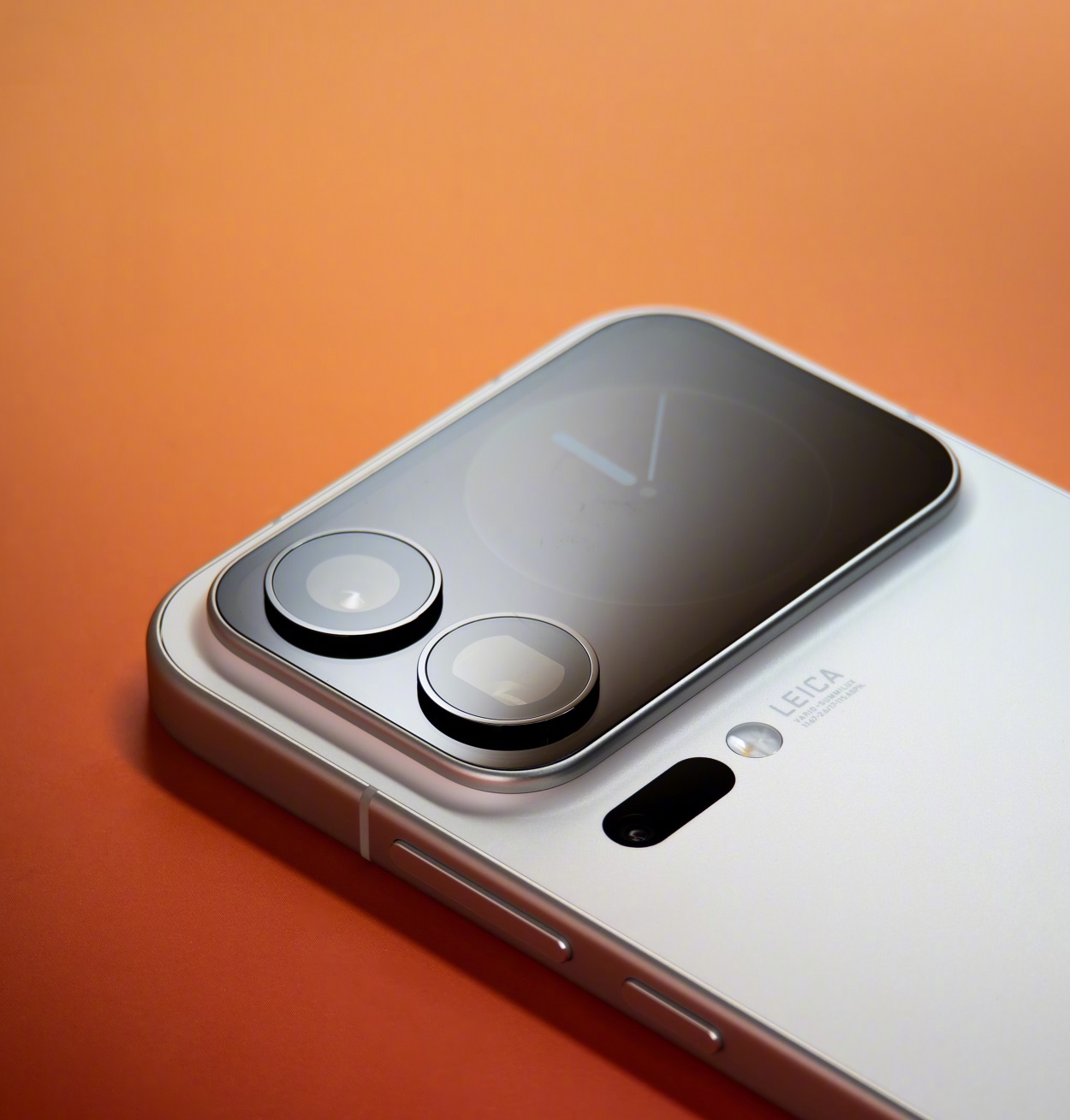 White smartphone with Leica camera display