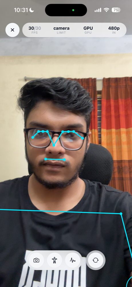 Live pose detection in a React Native app, the skeleton tracking a person