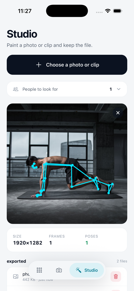 Pose detection on an uploaded photo, with the landmarks painted in