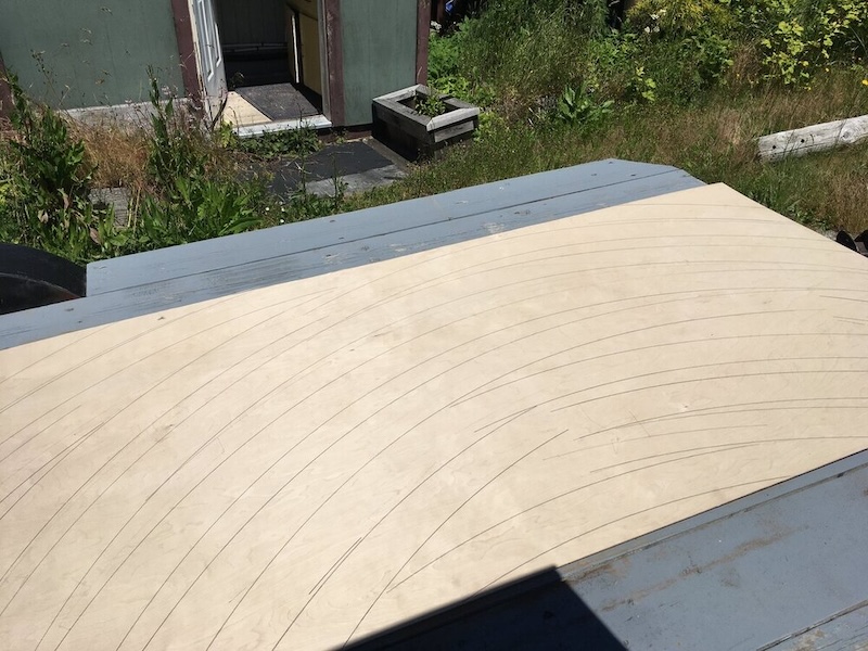plywood sheet with arced lines