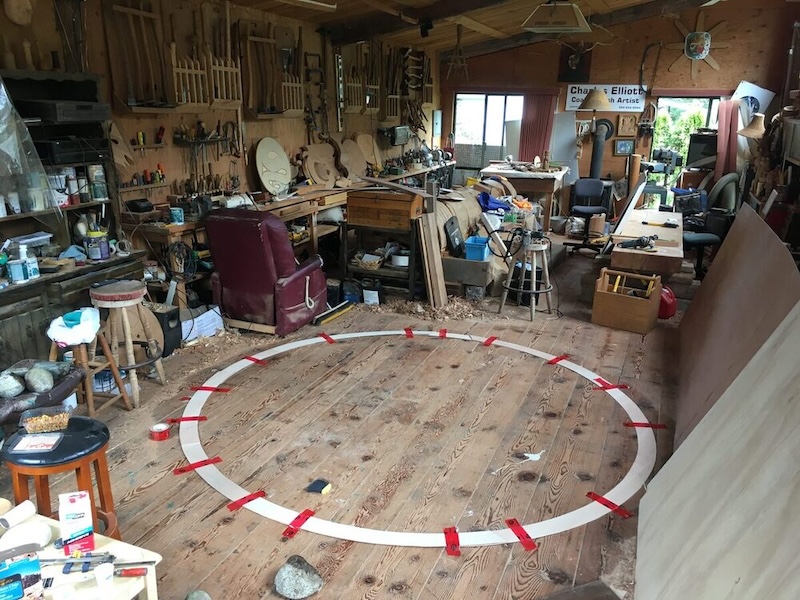 wooden circle on floor with taped joins