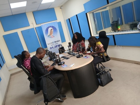 The panel discussion continues in the studio