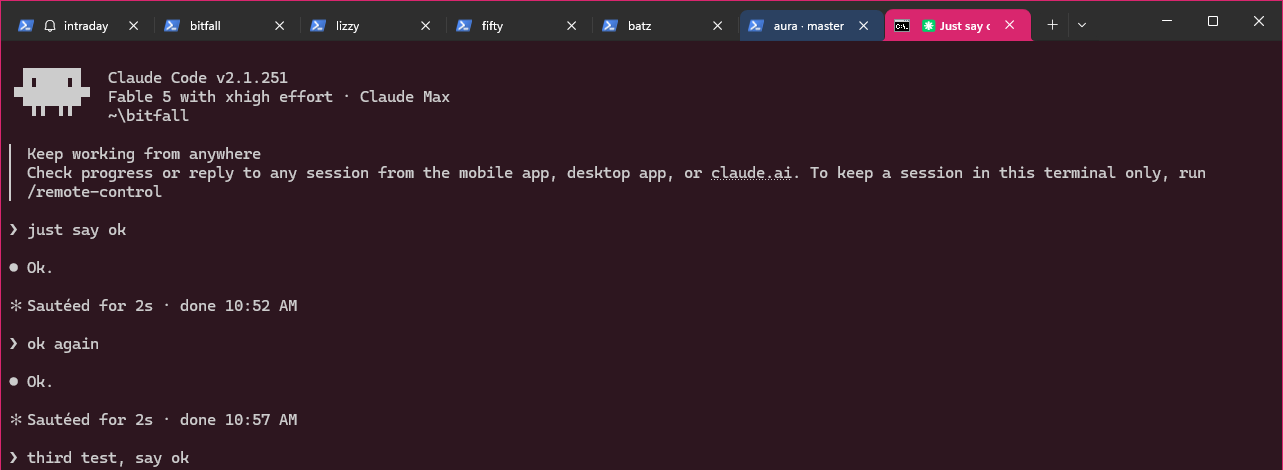 Live QA: pink tab + tinted pane + pink border for the bitfall session, blue tab for the aura session