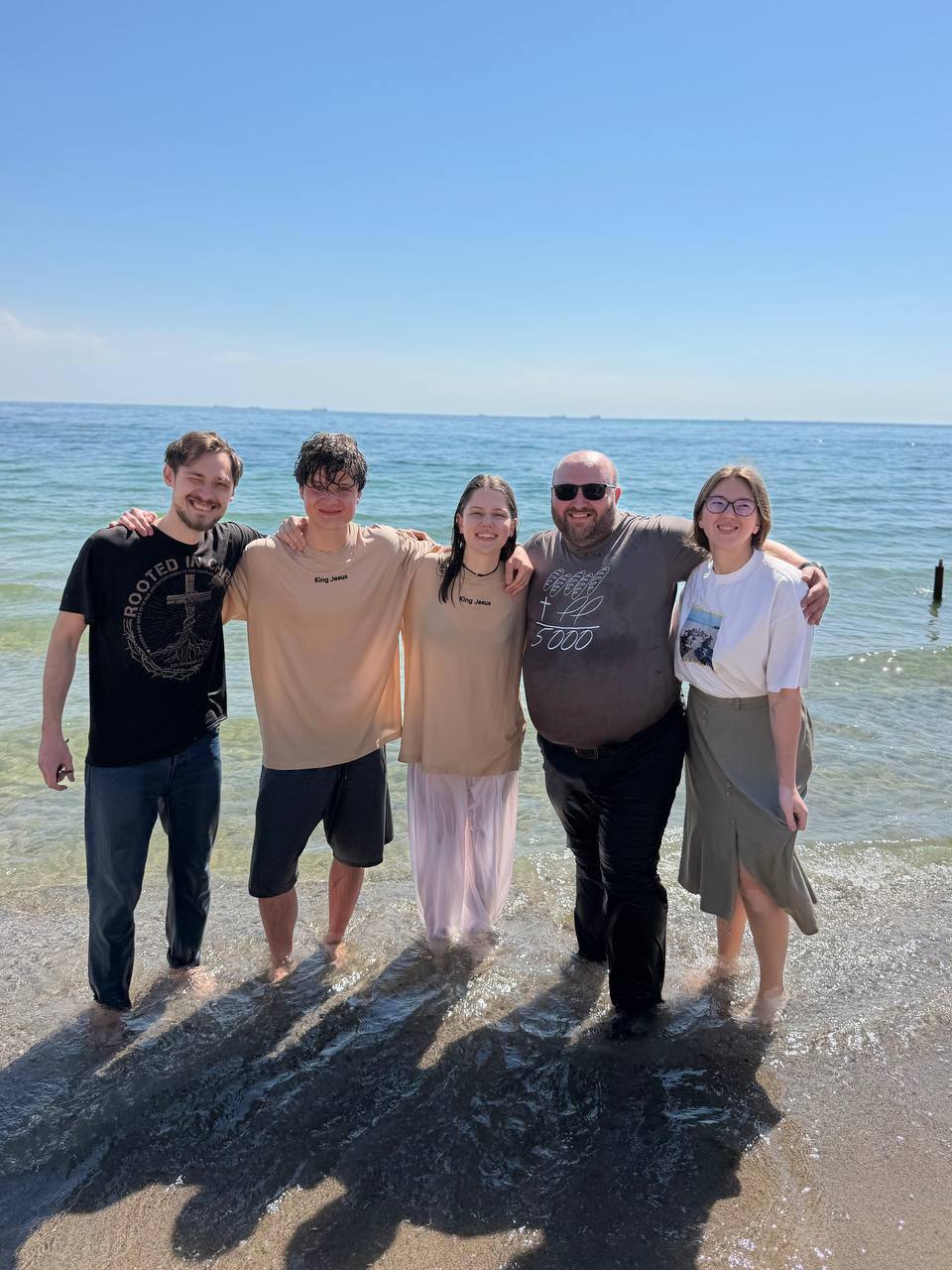 Maks and Nastia's baptism in the sea