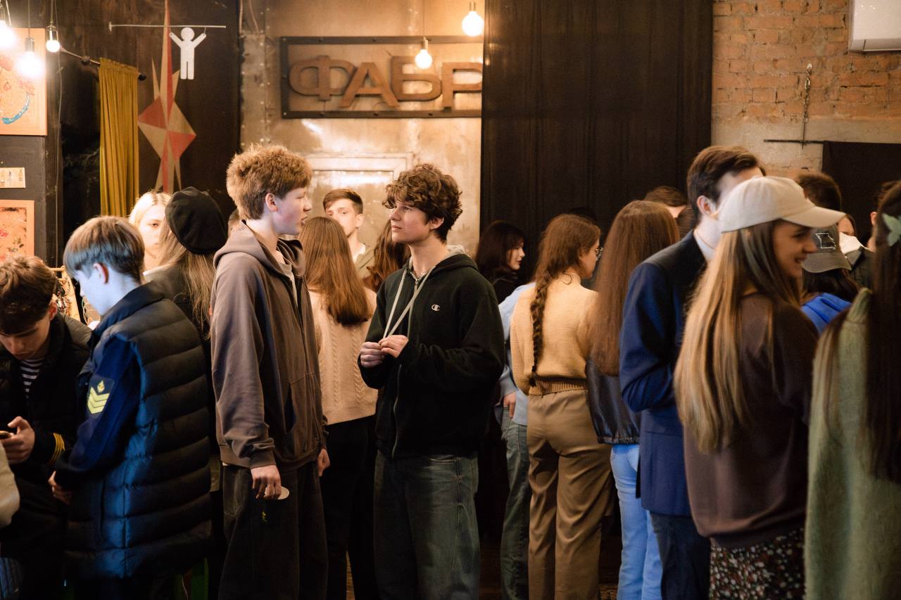 Students gathering between English Club sessions