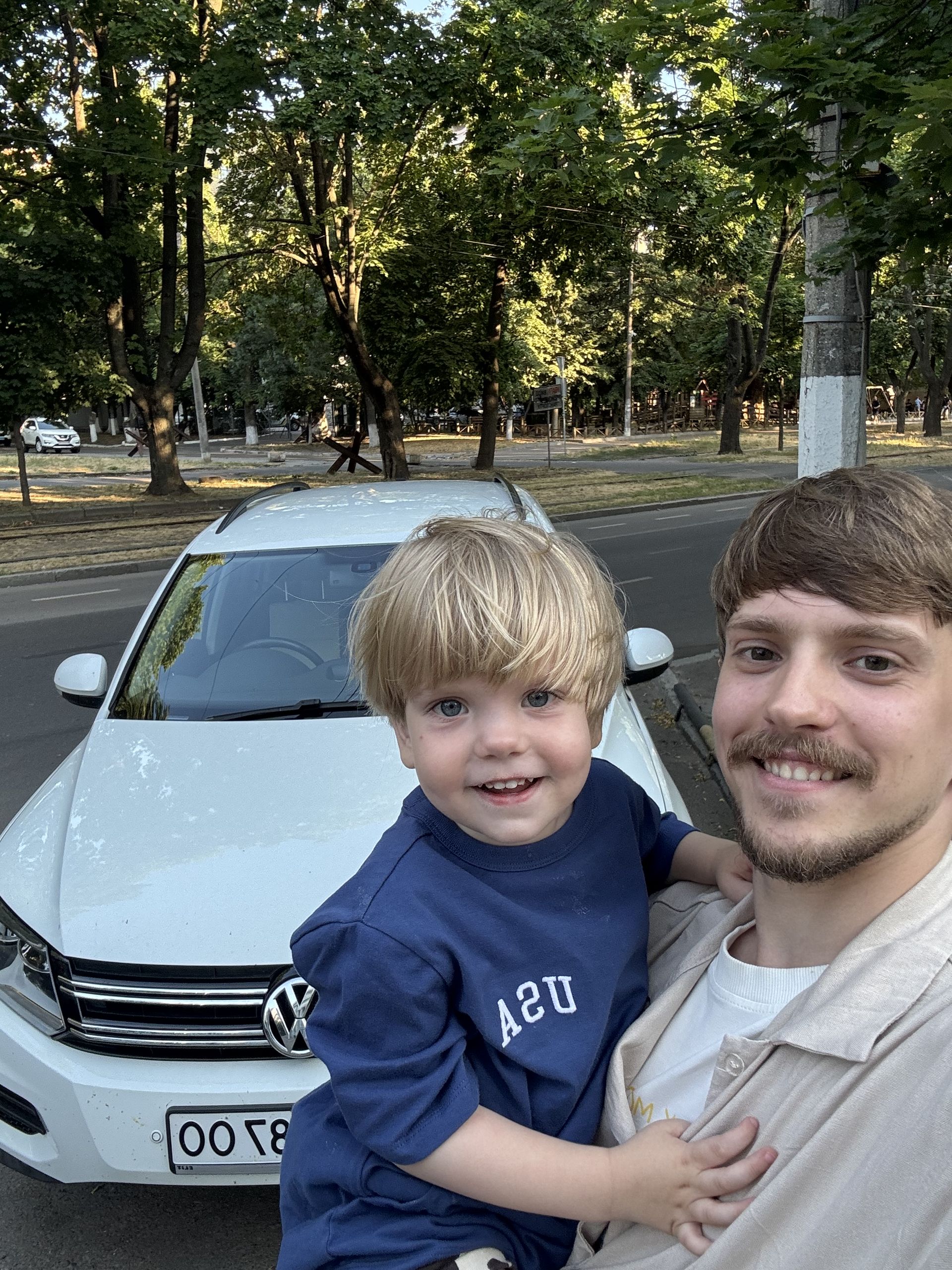 Kostia and Nazar with the ministry car