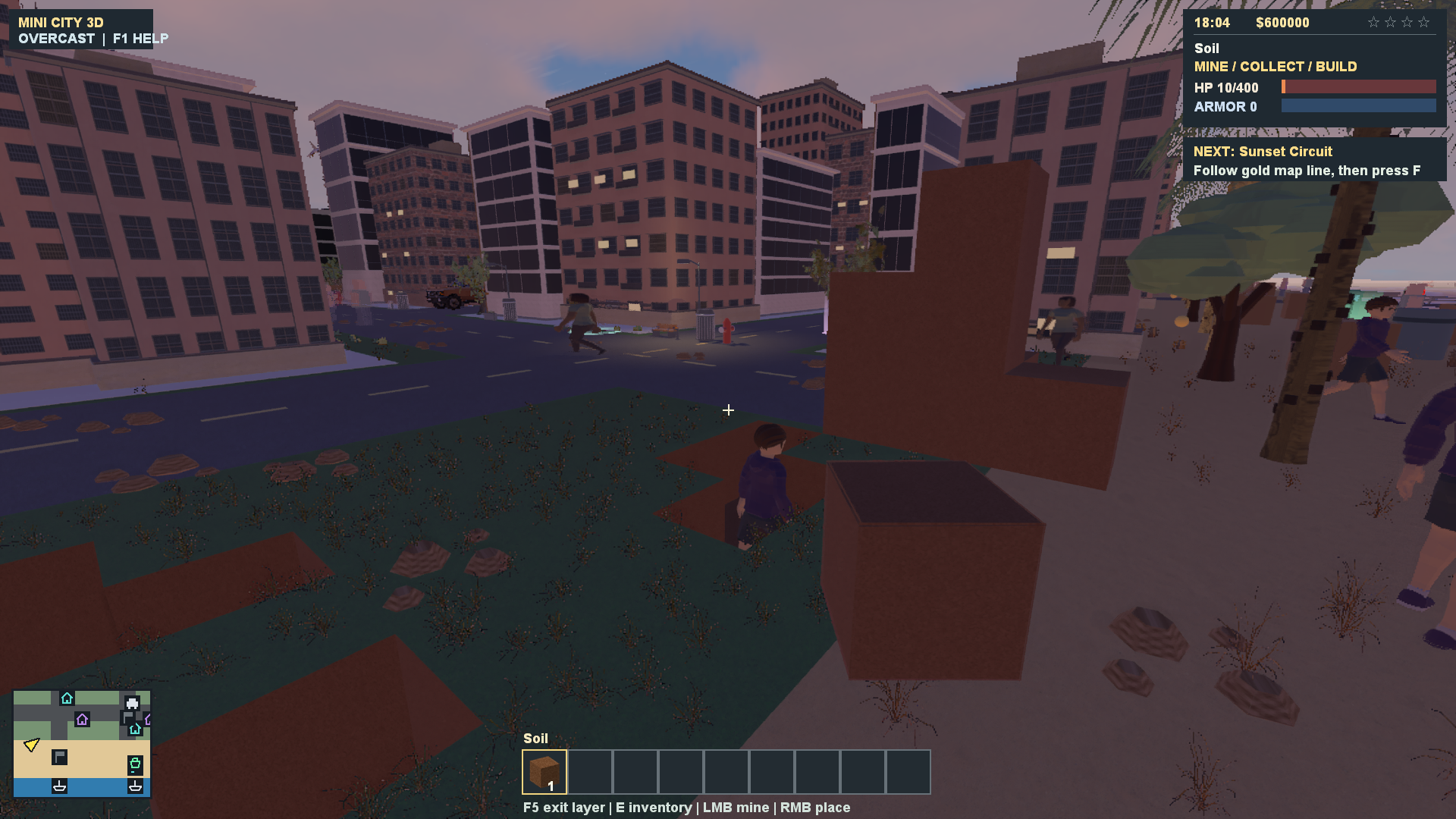 The player beside excavated terrain and stacked soil blocks in the city, with the builder hotbar visible