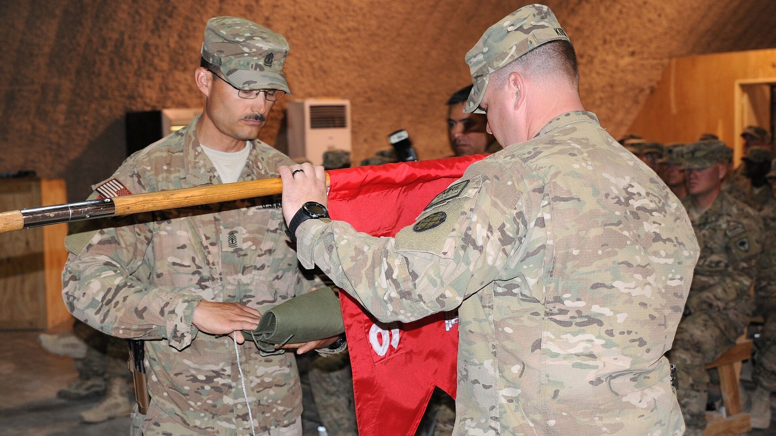 Illustrative photograph titled: 276th Eng. Co. assumes responsibility from 1223rd Engineers at Kandahar 140424-A-MU632-068