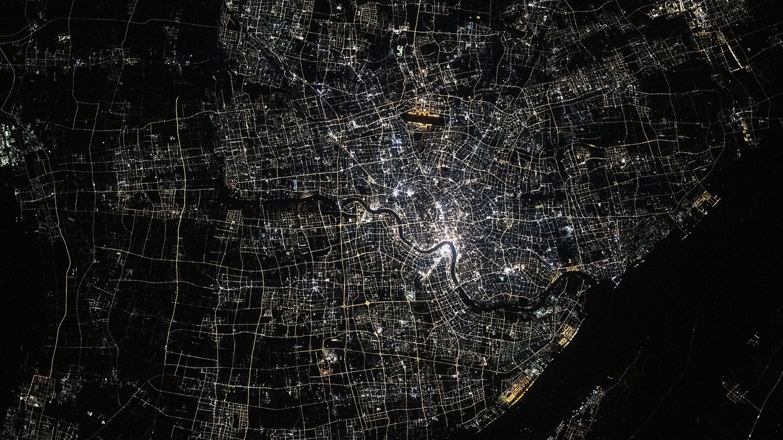 Illustrative photograph titled: Shanghai, China—the nation's largest city (iss073e0420094)
