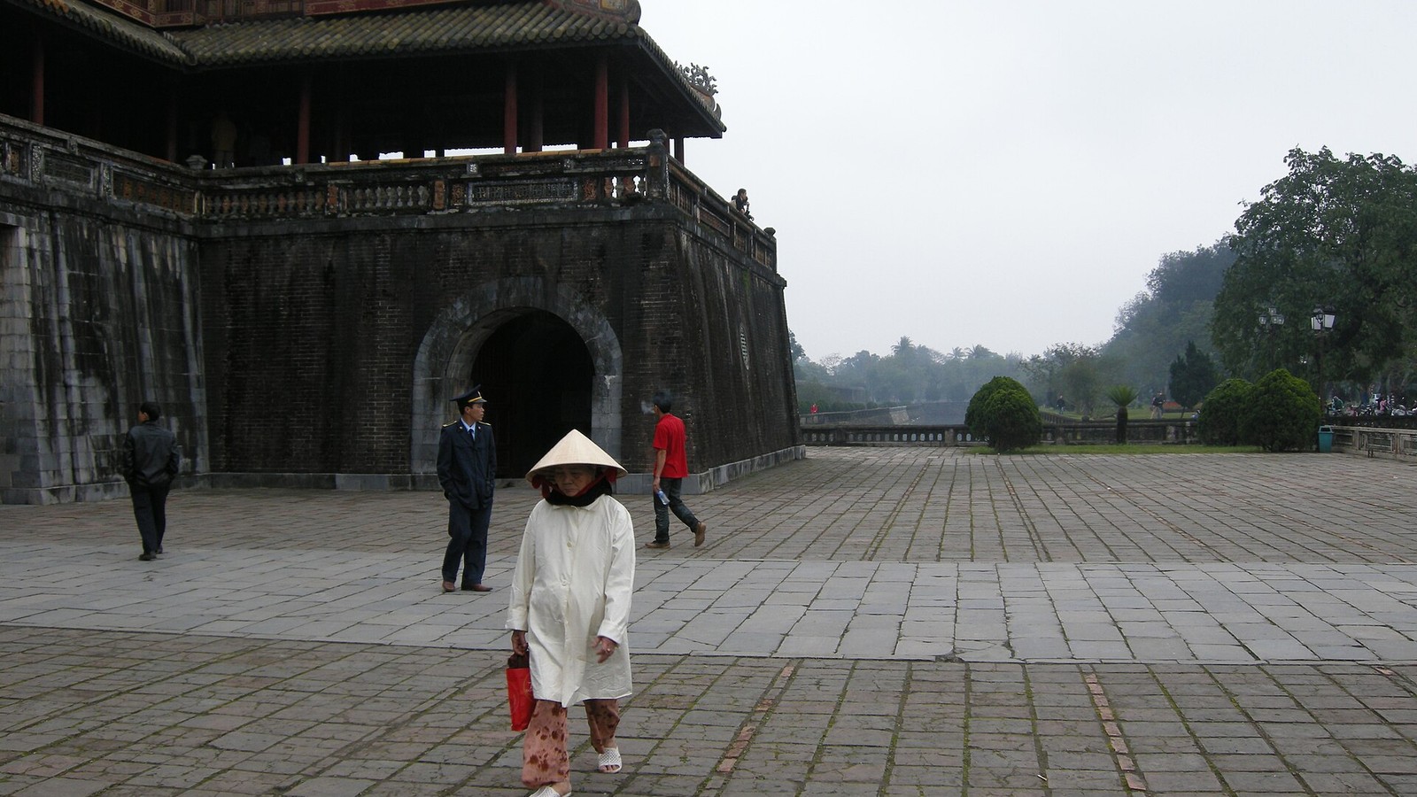 Illustrative photograph titled: Vietnam, Hue, Imperial City of Hue, People at the Meridian Gate