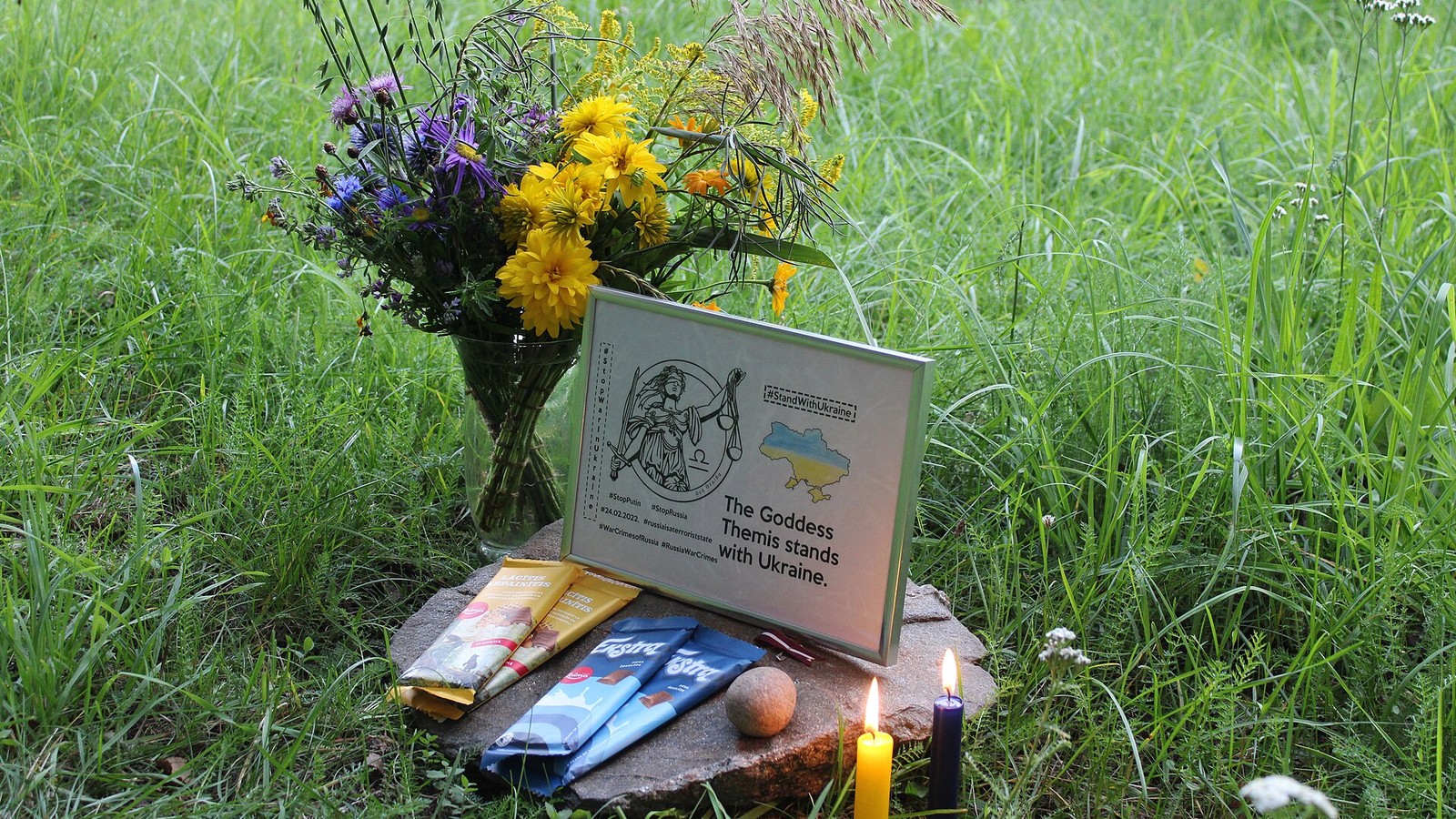 Illustrative photograph titled: Figure Goddess Themis stands with Ukraine A4 UA ENG portrait 3