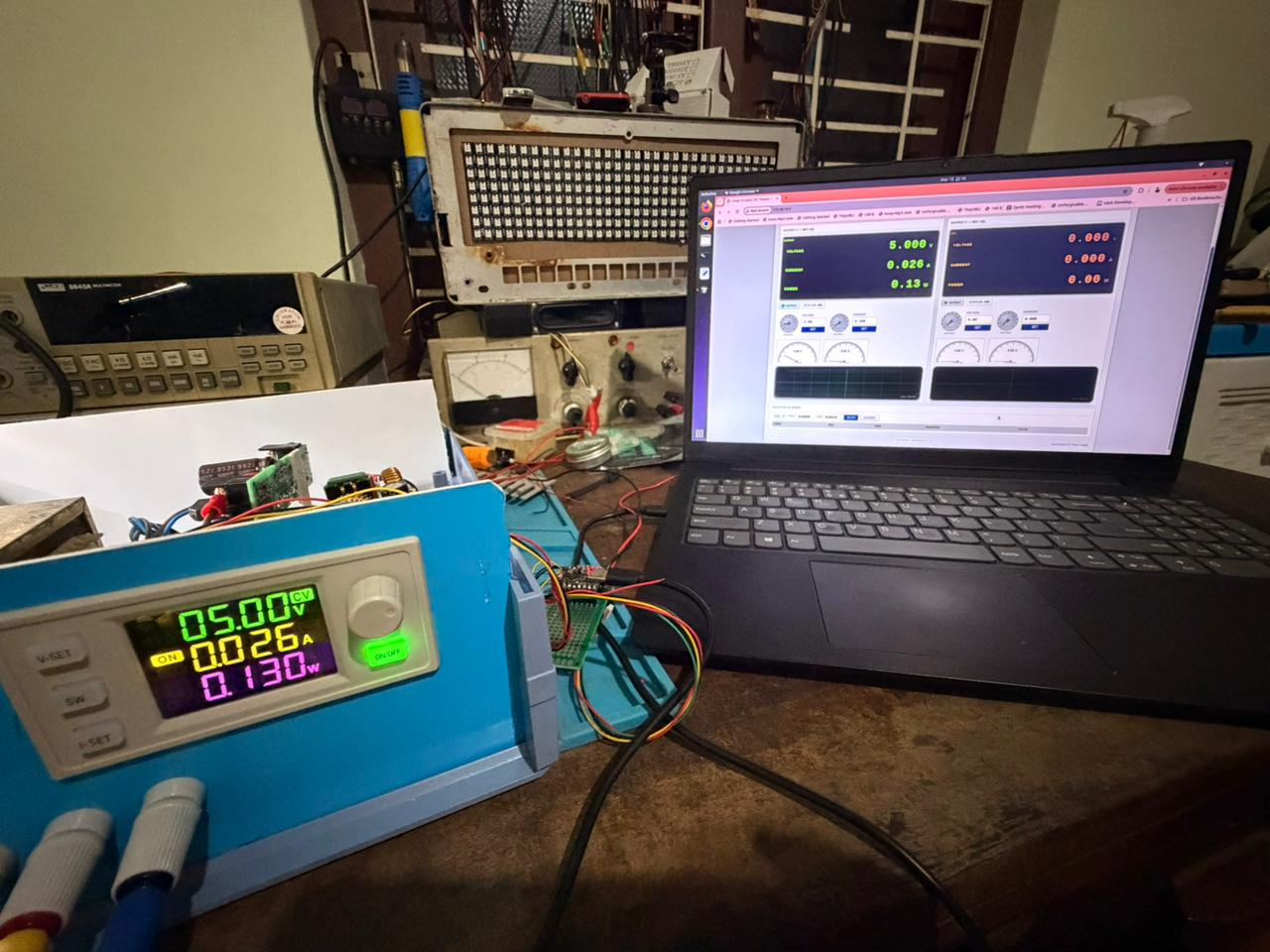 Bench: XY-SK120X display next to ESP32; laptop GUI matching voltage, current, and power