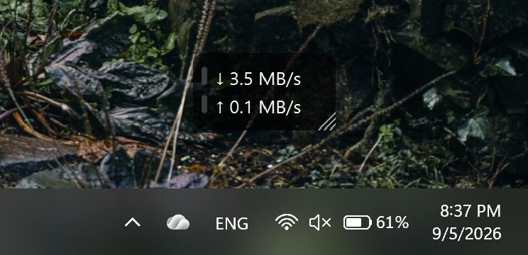 TinyNetUse download and upload speed overlay on the Windows desktop