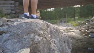 hiker standing on a rock