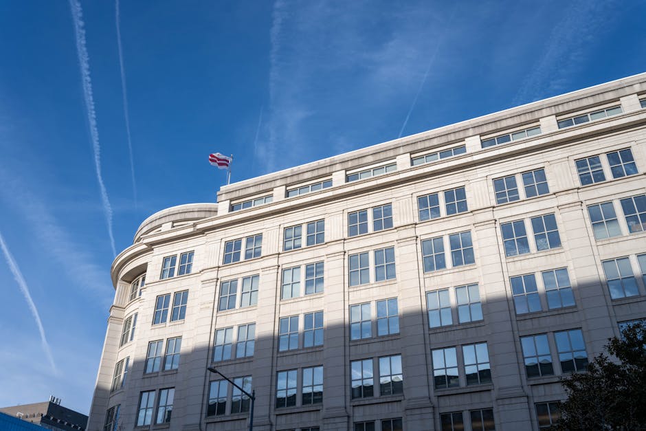 Elegant office building under a clear blue sky in Washington, D.C.