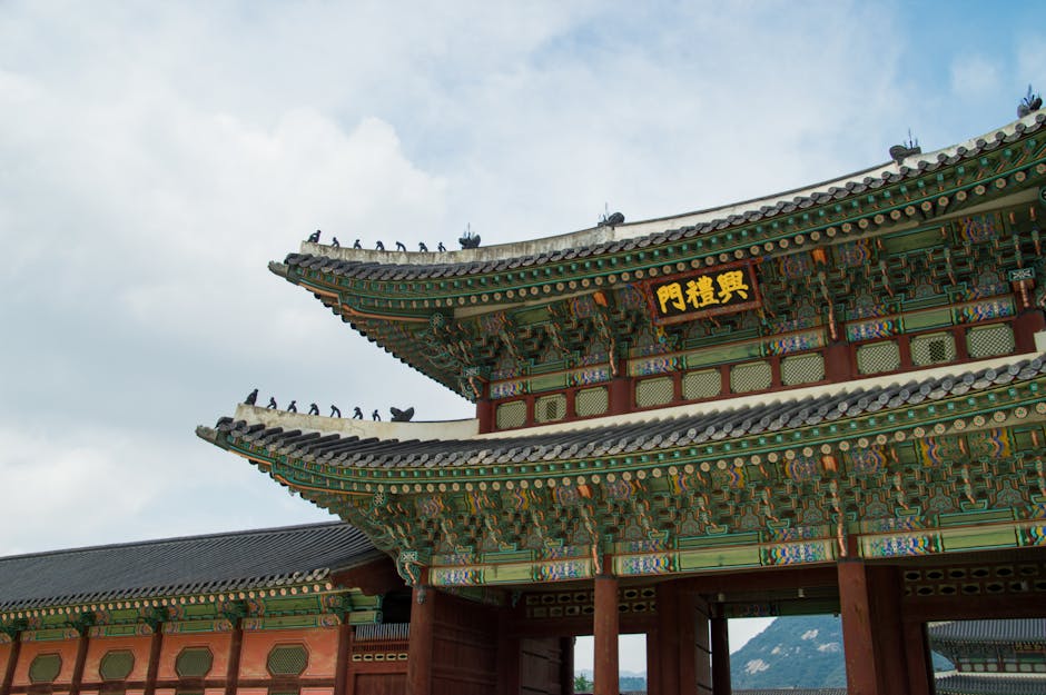 Explore the ornate architecture of Gyeongbokgung Palace in Seoul, showcasing traditional Korean design elements.