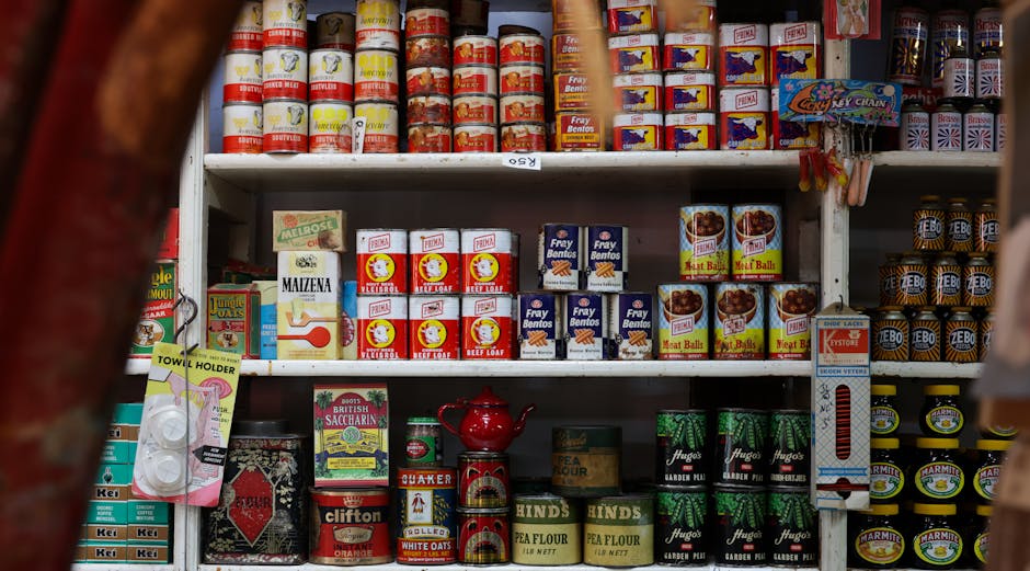 Explore classic canned goods on vintage grocery store shelves, showcasing nostalgic packaging and colors.