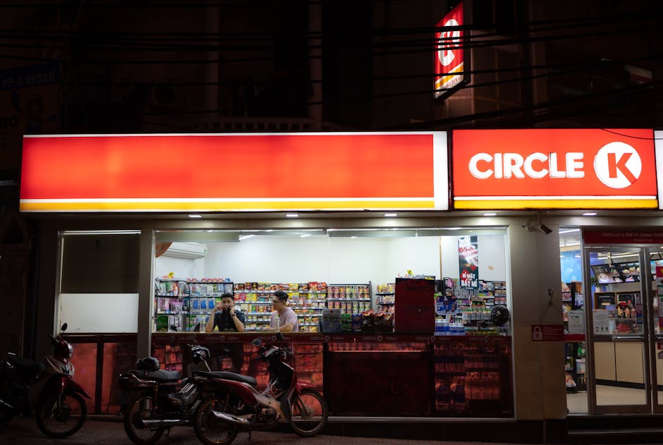 Brightly lit Circle K store with parked motorcycles and visible interior products.