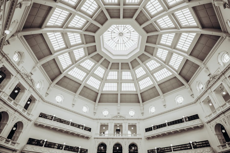 Low angle view of the grand dome in State Library Victoria highlighting architectural beauty.