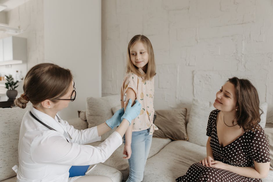A doctor checks a young girl's arm while her mother watches, emphasizing at-home healthcare.