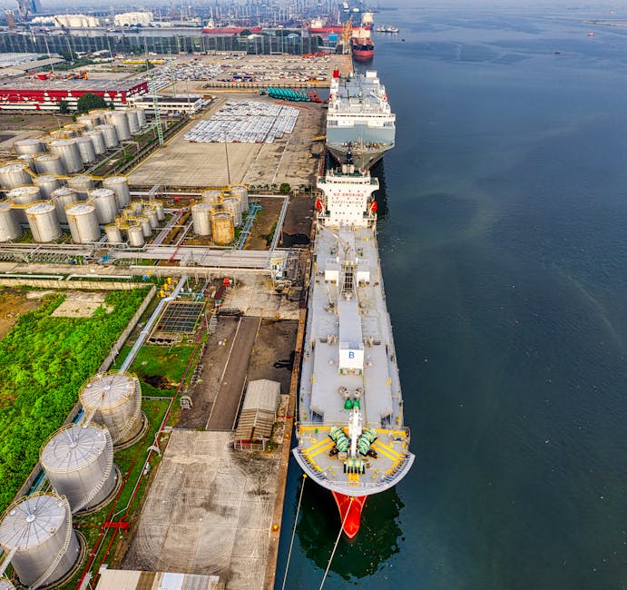 Aerial shot of oil tankers and storage facility in North Jakarta, Indonesia.