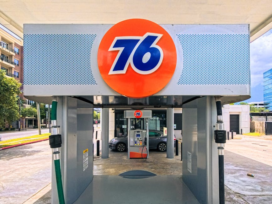 Front view of a 76 gas station in Houston, Texas on a sunny day.