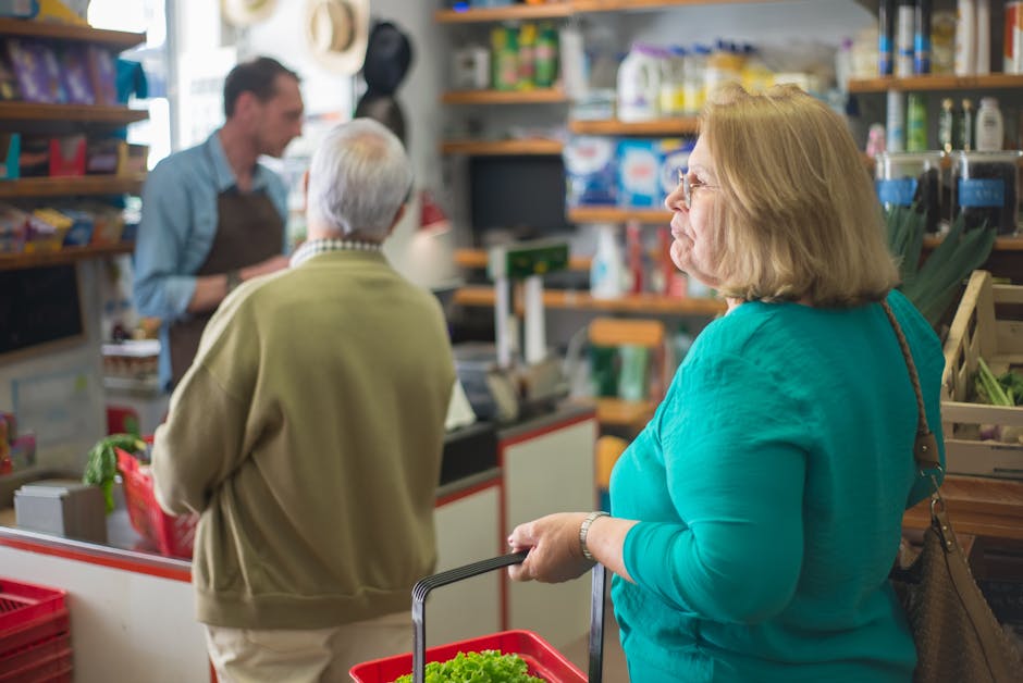 Senior woman with basket shopping in a cozy Portugal grocery store.