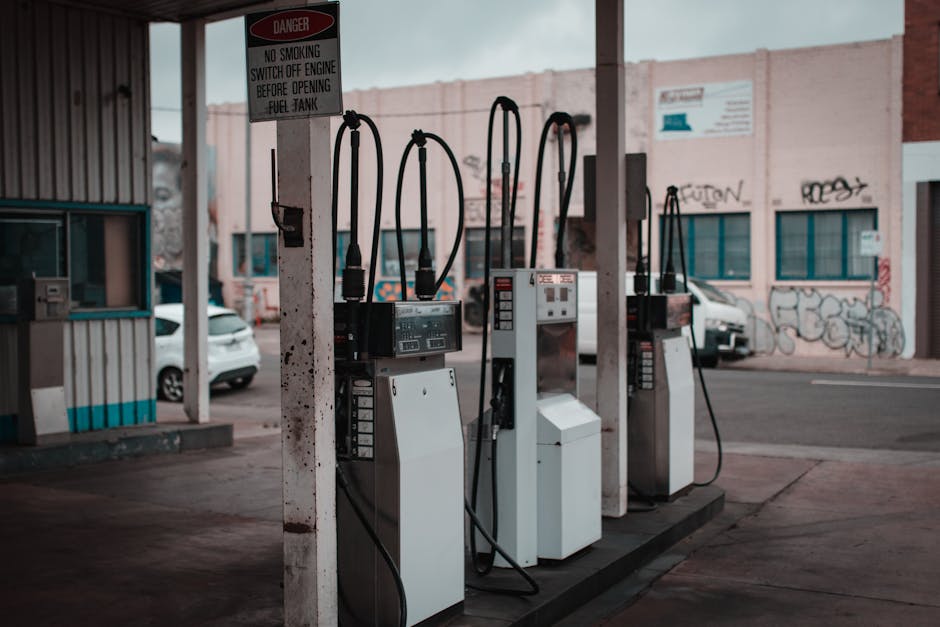 Empty gas station with visible graffiti in Collingwood, Australia.