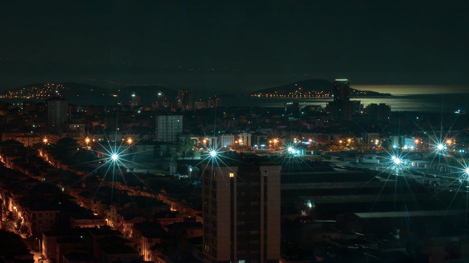 A stunning night view of Istanbul's cityscape with vibrant city lights and urban skyline.