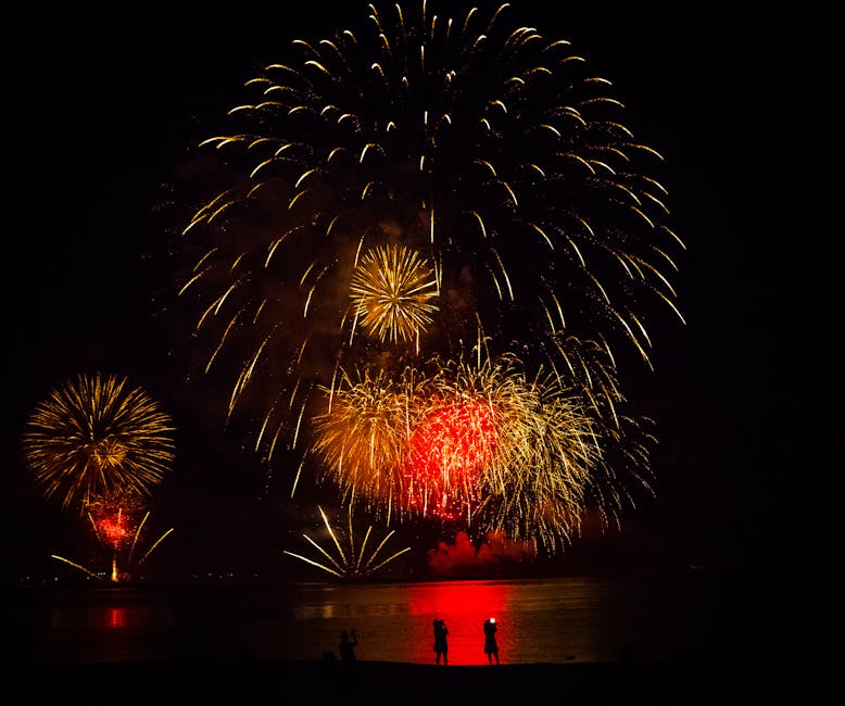 Dazzling fireworks light up the night sky over Ras Al-Khaimah, reflecting in the sea.