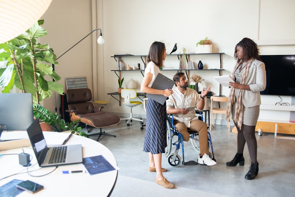 A diverse group of professionals brainstorming in a modern office setting.