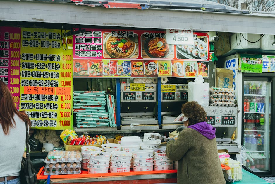 A vibrant Korean street food stall in Seoul, showcasing local culture and cuisine.